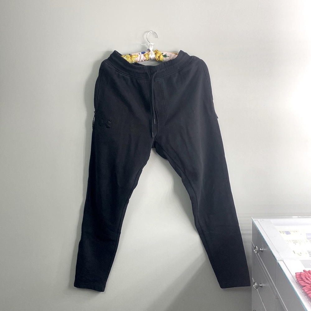 All black under armour sweatpants. Fitted.